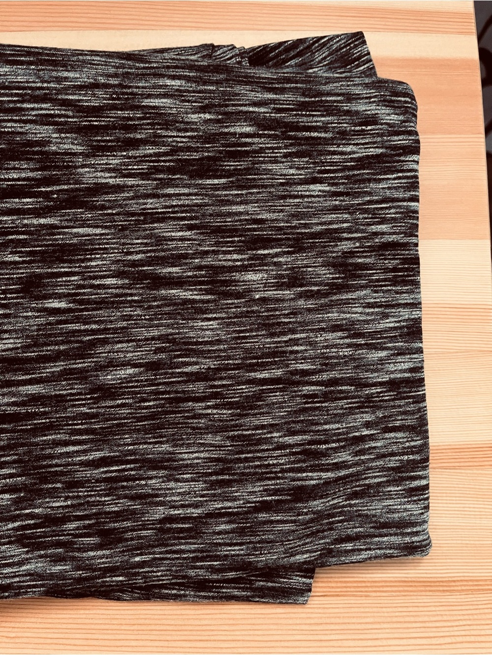 Synthetic fine heathered knit fabric for sewing
